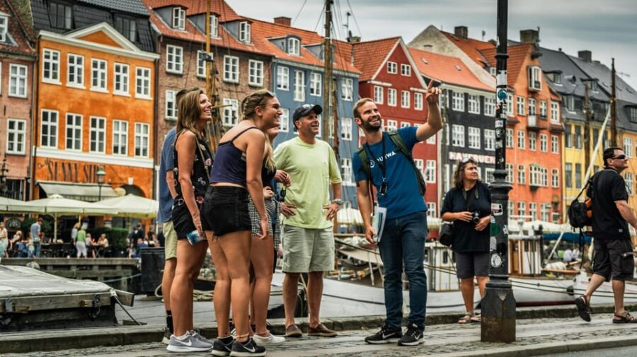 Copenhagen: 1.5-hour Private Walking Tour of Christianshavn - Crossing from Nyhavn to narrow Christianshavn streets: where the city plan becomes personal