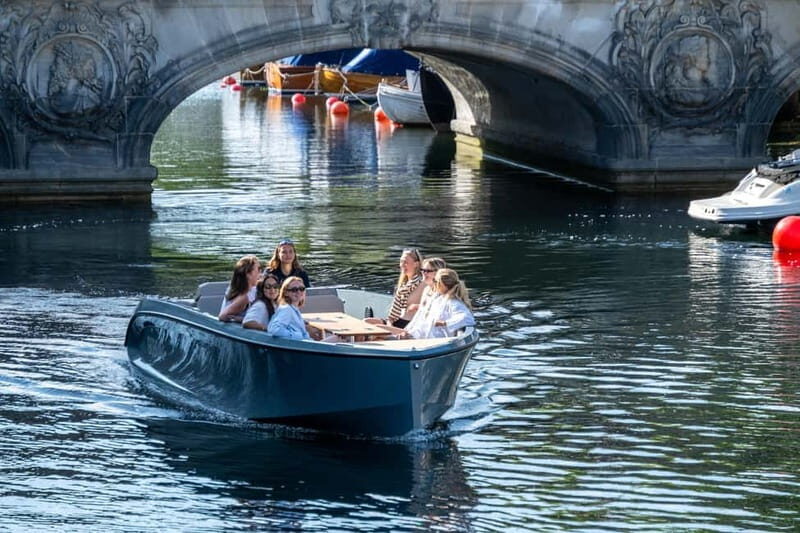 Copenhagen: 1 or 2-Hour Canal Tour in Silent Electric Boats - Your captain and the guide vibe: stories are part of the product