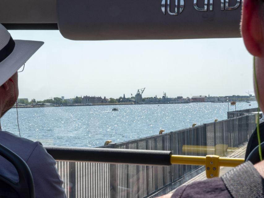 Copenhagen: Hop-On Hop-Off Bus Tour with Audio Guide - How Tivoli Gardens fits in: optional admission, flexible planning