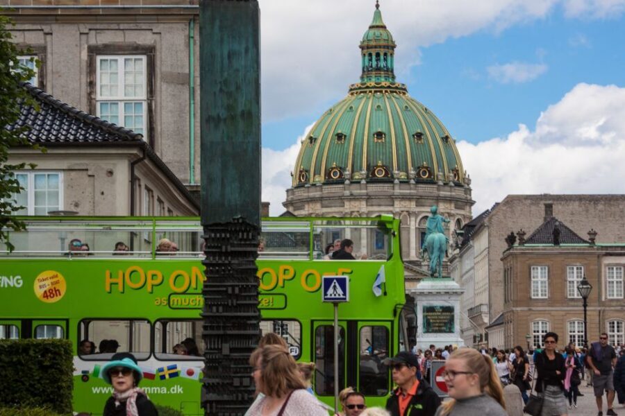 Copenhagen: Hop-On Hop-Off Bus Tour with Audio Guide - Boarding at Ved Stranden or Nyhavn, then jumping on anywhere