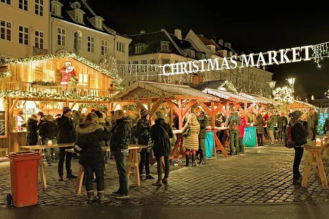 Copenhagen Private Christmas Walking Tour with Gløgg - Tivoli Gardens: spruce trees, warm lights, and a real backstory