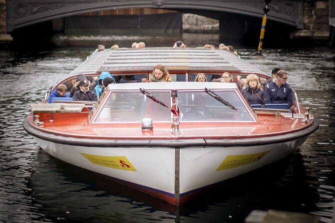 Copenhagen Sightseeing Classic Canal Tour With Live Guide - Christianshavn canals: pastel houses, cobbles, and King Christian IV