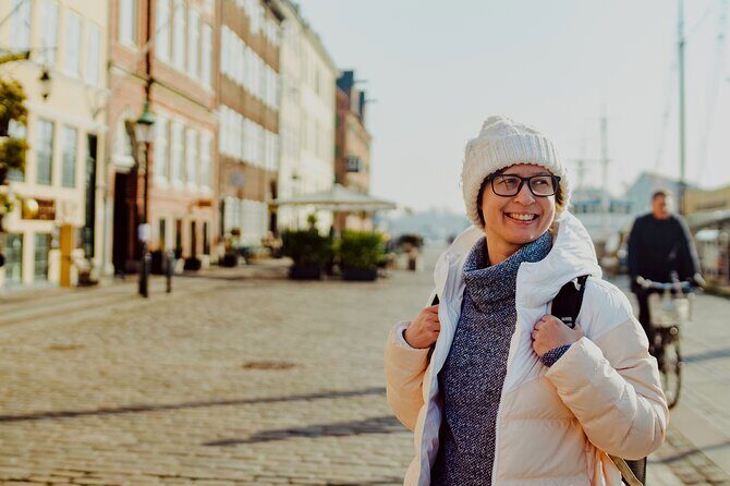 Highlights and Secrets of Copenhagen Private Walking Tour - Hoejbro Plads to Nikolaj Art Gallery: squares and a former church