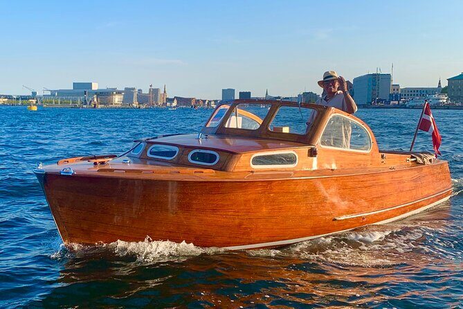Private Copenhagen Boat cruise in Scandinavian mahogany boat - Private mahogany boat cruise: why this hour works so well