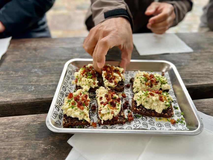 Secret walking Food Tour Copenhagen - Smørrebrød stop: bacon, egg, and truffle on Danish terms