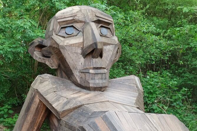 The Six Forgotten Giants Trolls Hunt with Minibus - Stop 3 in Ishøj: scar under the bridge Built from Scrapwood