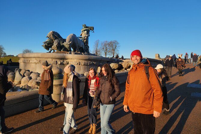 Walk & Canal Tour: Copenhagen Highlights + Changing of the Guards - Tivoli Gardens outside stop: Copenhagen charm in five minutes